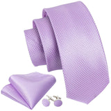 Lavender tie, pocket square, and cufflinks set on a white background