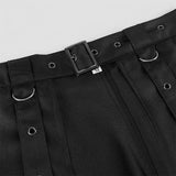 Close-up of a black belt with a buckle on a plain background