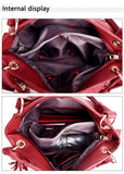 An internal view of a red handbag, showcasing multiple compartments and pockets for organization.