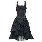 Black gothic dress with a corset top featuring crisscross lacing and ruffled straps. The skirt is layered and voluminous, conveying an elegant, dramatic tone.