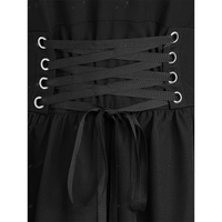 Close-up of a black corset-style dress with crisscrossed lacing through silver eyelets. The fabric has a gathered texture, creating a structured, elegant look.