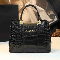 Elegant black crocodile-patterned handbag with gold accents and the brand name "Menglinkai" displayed prominently on the front.