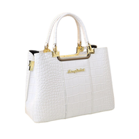 Elegant white crocodile-pattern handbag with gold accents and top handles, featuring the brand name "Menglihua" in gold lettering.