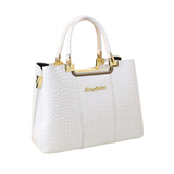 Elegant white crocodile-pattern handbag with gold accents and top handles, featuring the brand name "Menglihua" in gold lettering.