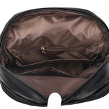 Interior of a black bag showing a smooth brown lining with a zip pocket and two additional compartments for organization.