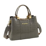Stylish gray handbag with a crocodile texture, featuring gold accents and a detachable strap, perfect for chic outings.