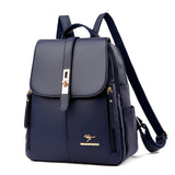 Stylish navy blue backpack with a sleek design, gold accents, and a front flap fastened by a decorative clasp.