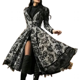 A woman modeling a vintage dark gothic swing coat with long sleeves, V neckline, and a flared skirt with lace trim at the mid-calf hemline.