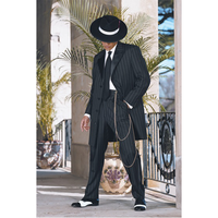 A person in a stylish pinstripe suit and fedora stands beside tall potted plants on a stone porch. The scene is elegant and retro, evoking a vintage vibe.