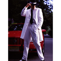 A person in a stylish white suit and black hat stands confidently by a red vintage car. The scene exudes a retro and suave vibe.