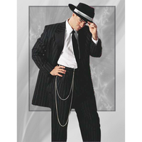 Man in pinstripe suit and fedora poses stylishly against a gray background, conveying a vintage gangster vibe. The suit features a chain accessory.
