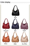 A display of eight stylish handbags in various colors: black, wine red, blue, purple, brown, khaki, and rice white.