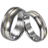 Two tungsten carbide rings with a sleek silver finish and a central gold stripe, symbolizing unity and elegance. Rings display "Tungsten Carbide" text inside.