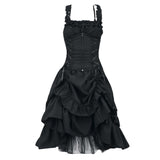 Black Gothic dress with ruffled straps and lace-up corset bodice, featuring a high-low layered skirt with dramatic, voluminous ruffles. Elegant and dramatic.