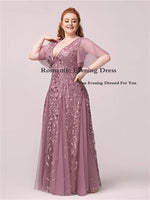 A woman wearing a mauve evening gown with floral embellishments and sheer sleeves. Text overlay reads "Romantic Evening Dress." The mood is elegant.