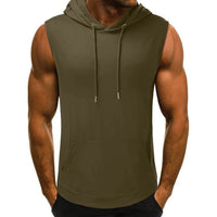 A muscular man wears a sleeveless olive green hoodie with a hood and drawstrings. His hands are in the front pocket, and he stands against a white background.