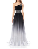 A womanwearing, one-shoulder evening gown with a gradient from black to white. The dress features sparkling embellishments on the strap and waist, conveying elegance.