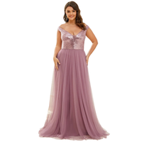woman wearing a lavender evening gown with a sequined bodice and flowing tulle skirt. The tone is elegant and joyful.